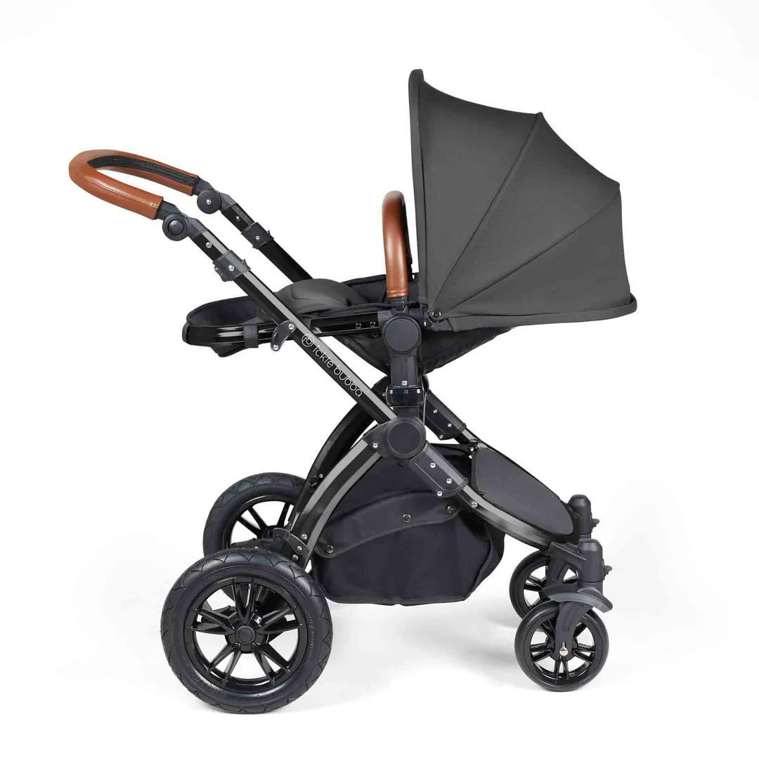 Ickle Bubba Stomp Luxe 12 Piece Travel System with i-Size Nimbus 180° Spin Car Seat & ISOFIX Base Charcoal Grey on Black