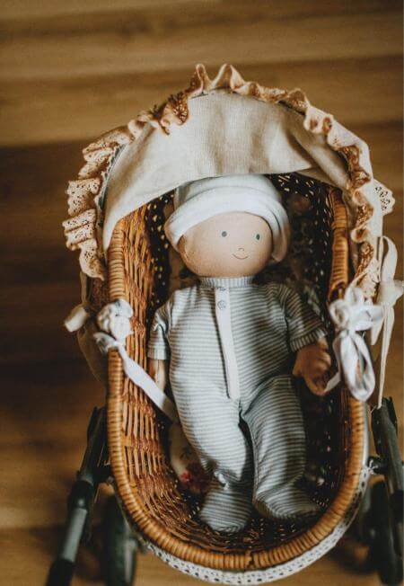 Rainbow Design Tikiri Cherub Baby Boy In Blue