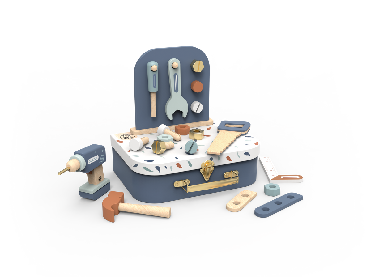 Toy tool chest set with various tools on a white background