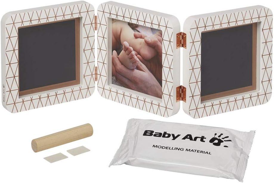 Baby Art triptych baby modelling cast frame with three panels, shown open with two blank black moulding plates and one photo insert, alongside a wooden roller, two small sanding discs, and a packet of Baby Art Modelling Material.