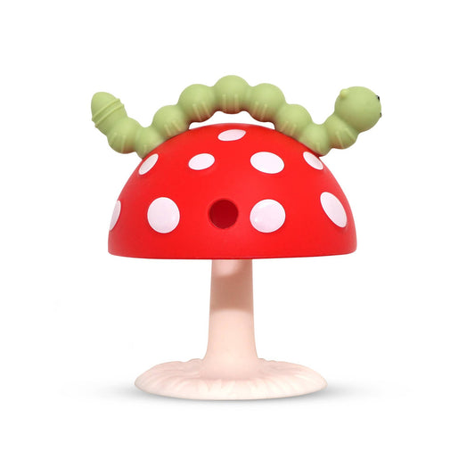 Toy mushroom teether with green caterpillar on a white background