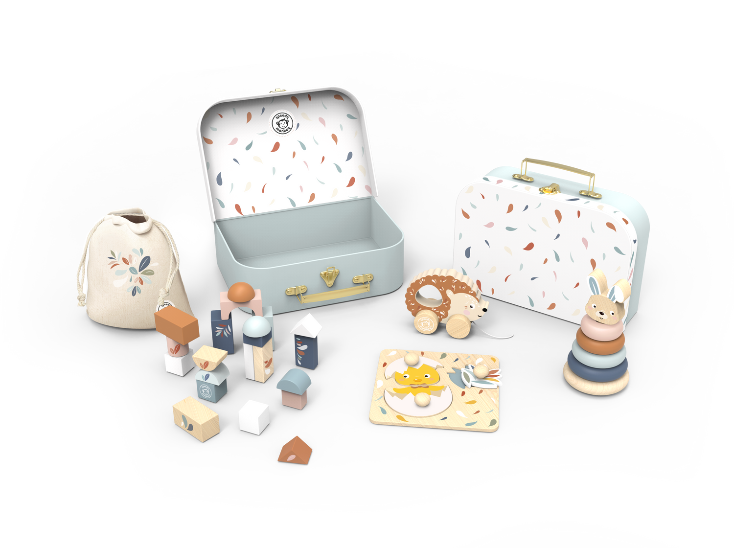 Collection of children's toys including a suitcase, blocks, and a teether on a light gray background