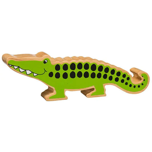 Toy alligator with green body and brown top on a white background