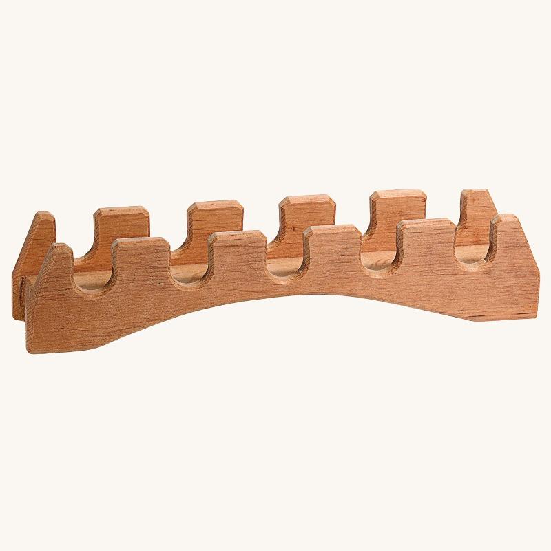 Wooden guitar neck bridge on a white background